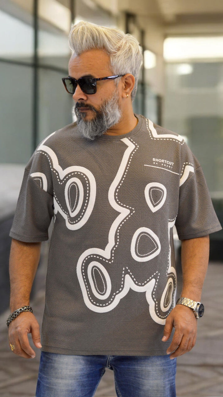 "grey oversized T-shirt in premium Jacquard fabric with puff print – Trendy streetwear"
