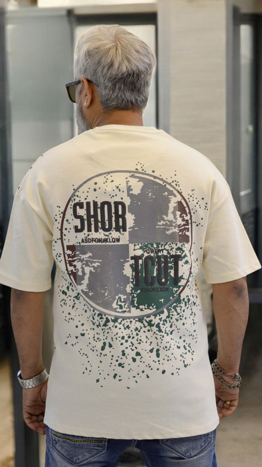 Back View: "Back view of white oversized T-shirt – Trendy drop-shoulder fit with puff print"
