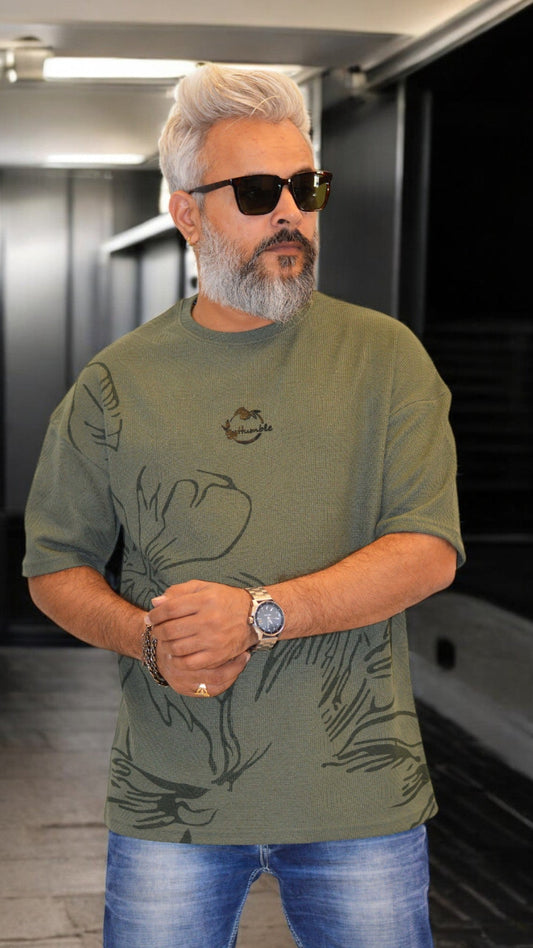 Side View: "Side profile of green oversized T-shirt – Premium quality fabric and unique embossed design"
