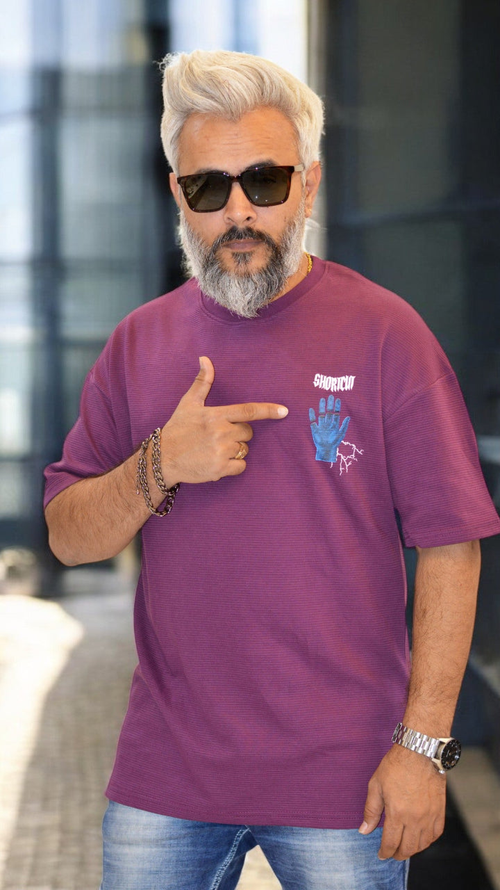 dark purple oversized T-shirt – Relaxed fit with eye-catching puff print"
Rust Oversized T-Shirt