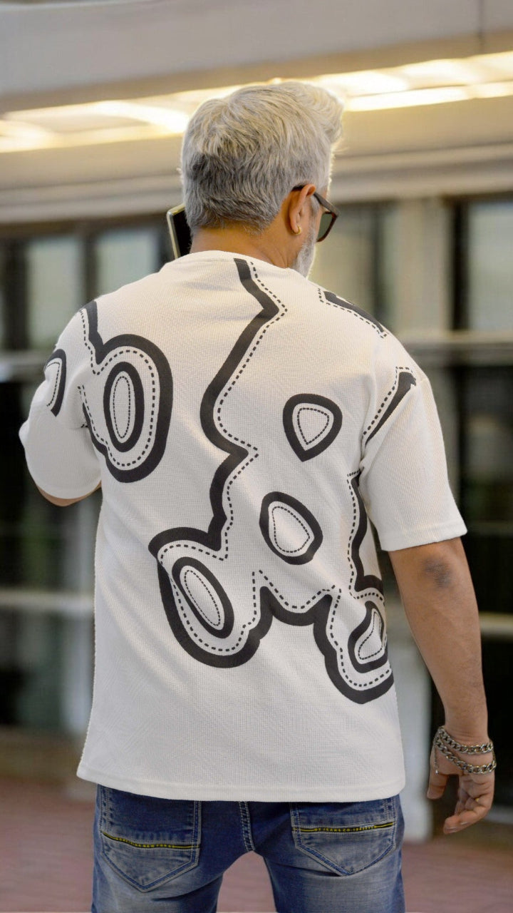 Back View: "Back view of white oversized T-shirt with puff print – Korean streetwear style"
